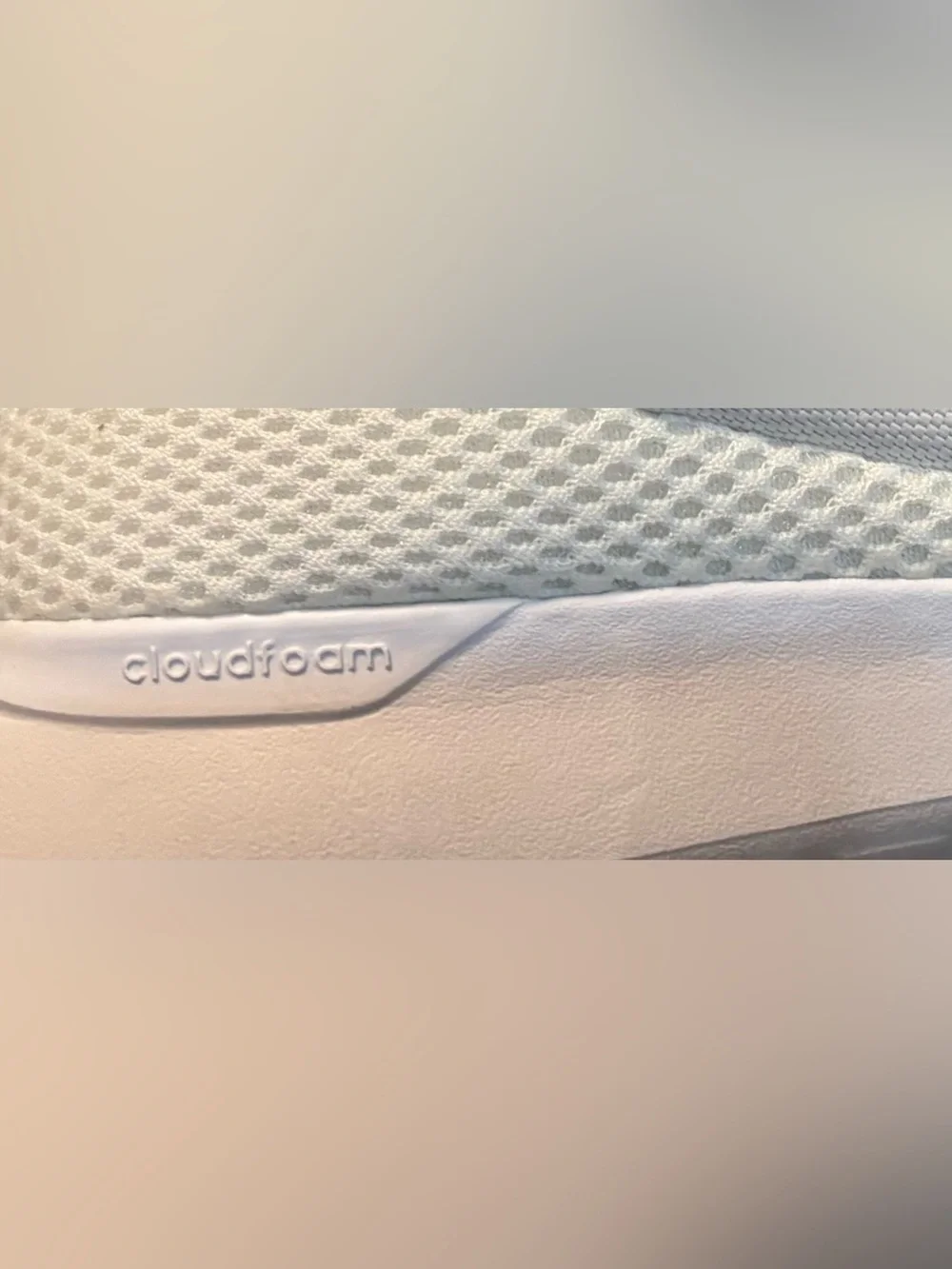 adidas Women's White Slip-On Sneakers with Rainbow Logo
